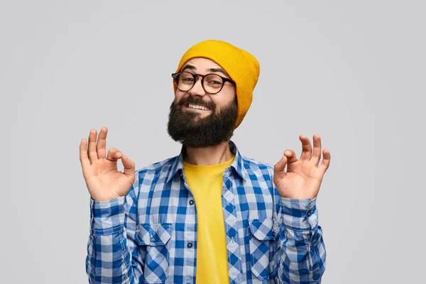 Relaxed man gesturing OK — Stock Photo, Image