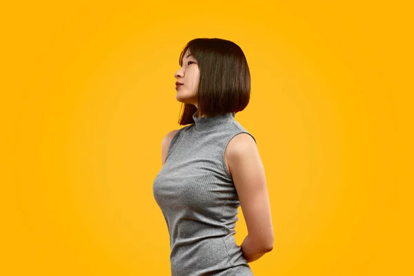 Stylish Asian woman looking away — Stock Photo, Image