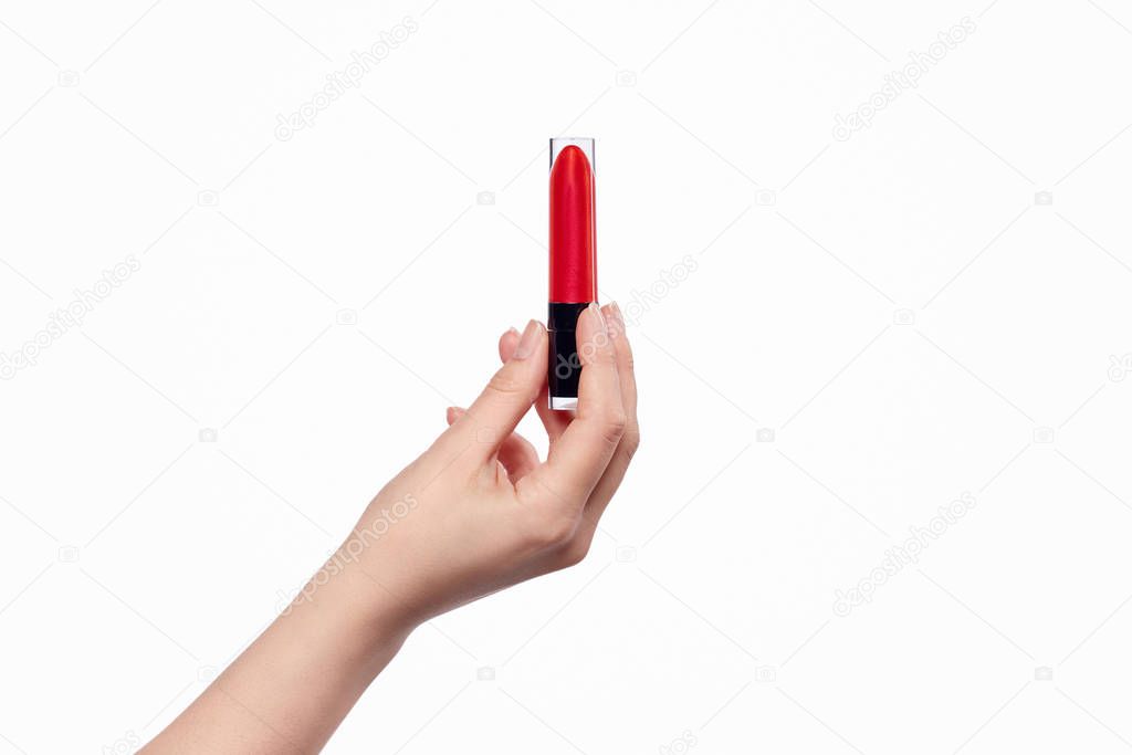 Crop hand with red lipstick