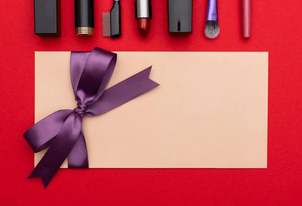 Gift certificate near makeup supplies — Stock Photo, Image