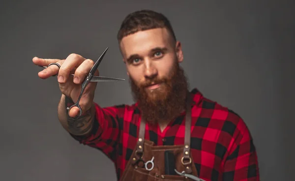 Bearded hipster with scissors — Stock Photo, Image
