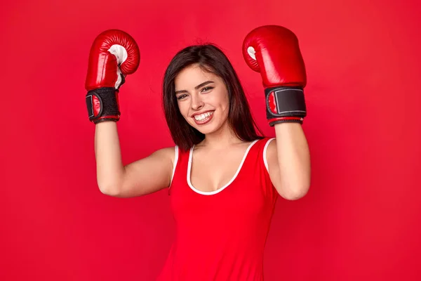 Female boxer celebrating victory