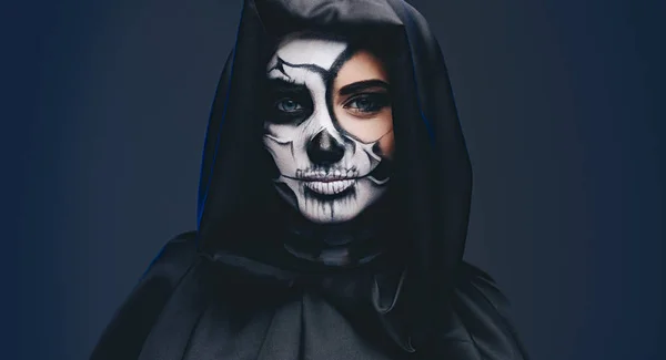 Young female in hooded cape with scary makeup — Stock Photo, Image