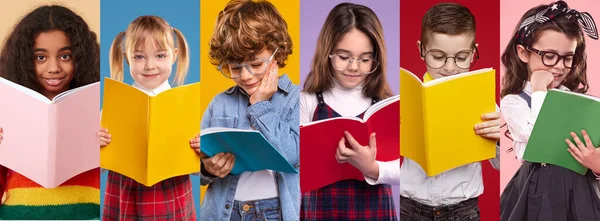 Slimme diverse kinderen met leerboeken die huiswerk maken — Stockfoto