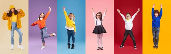 Elegante diversas crianças se divertindo — Fotografia de Stock