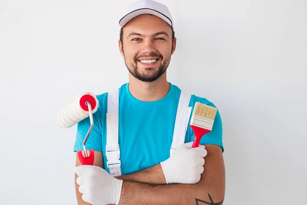 Positive male painter with tools — Stock Photo, Image