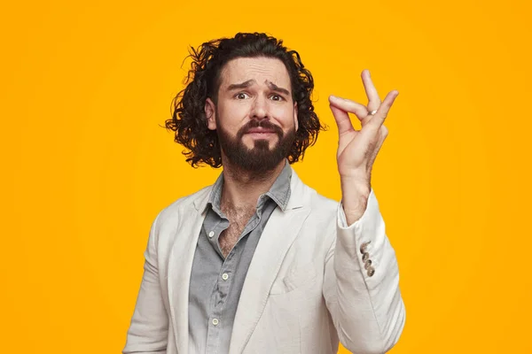 Male cook gesturing and looking at camera — Stock Photo, Image