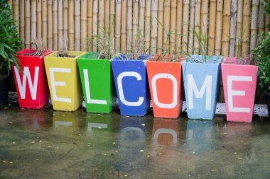 pot Bambu duvar arka plan üzerinde hoş geldiniz metin