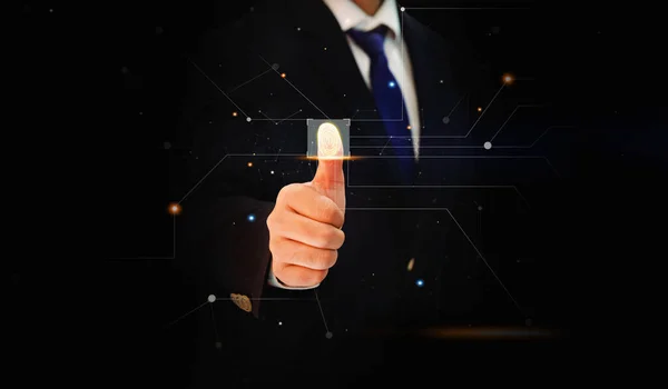Thumb Print Touching the Screen with glowing lights and blur backdrop. Man wearing tie and touching the thumb on screen