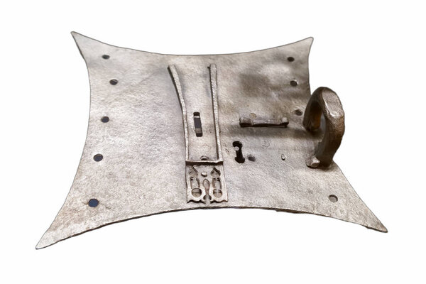 This antique metal artifact showcases unique craftsmanship with detailed designs. It features a prominent hook and slots, likely used for securing items in the medieval era.