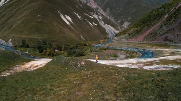 Girl Walks Alone Mountains Aerial Survey — Stock Video