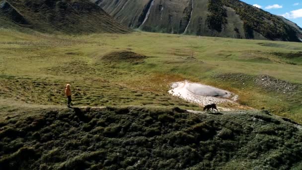 Girl Walks Alone Mountains Aerial Survey — Stock Video