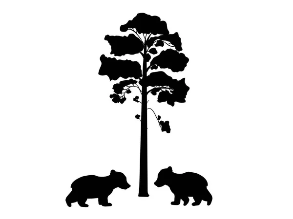 Dois ursos de filhote perto de árvore silhueta animal — Vetor de Stock