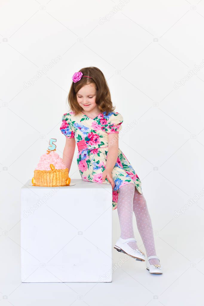 birthday girl five years old with cake. celebration. smash cake decorations, 5