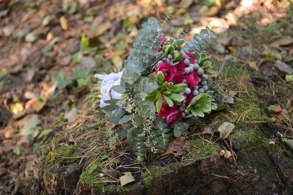 set of autumn wedding decor outdoors. Floral arrangement of flowers and fruits. details of the wedding ceremony. staging for the newlyweds decorator