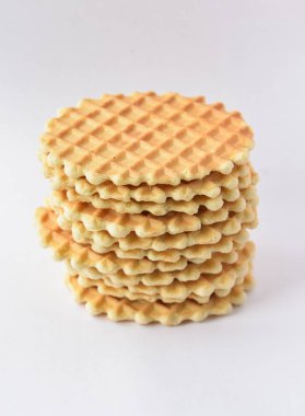 Bir yığın yuvarlak beyaz arka plan üzerinde izole gözleme.