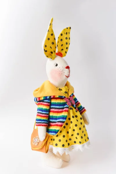 Handmade toys made of fabric for children or as a gift. Hare rabbit