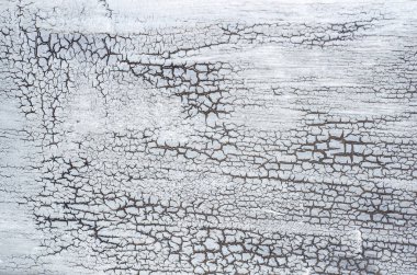 Gri doku ile raller. Soluk gümüş soyulması boya ile eski ahşap arka plan. Eski ahşap boyalı dokulu yüzeyi.