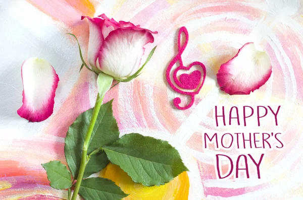 Rose op een pittoreske doek achtergrond. Wenskaart Mother's Day, Vrouwendag. — Stockfoto
