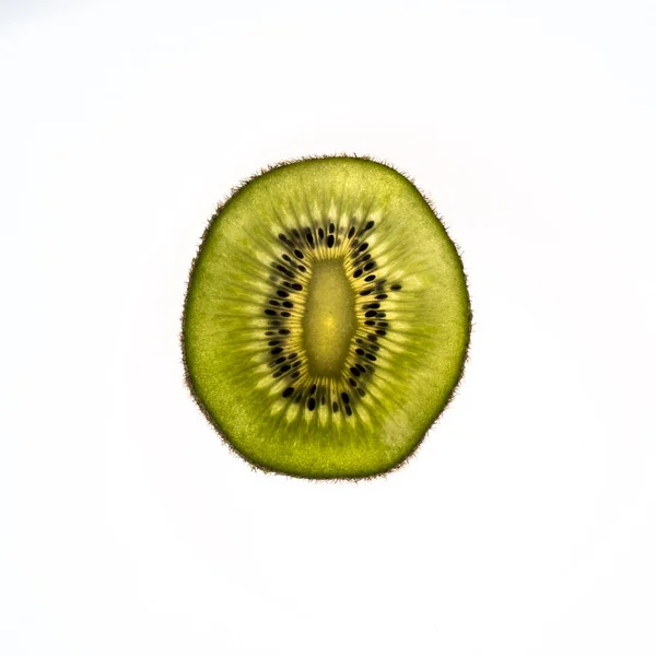 Rebanada Kiwi Iluminado Desde Parte Posterior — Foto de Stock