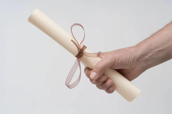 Diploma Rolled Tied Red Ribbon Hand — Stock Photo, Image