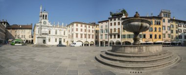 The fountain in the center of  Matteotti iSquare n the center of Udine, Italy clipart