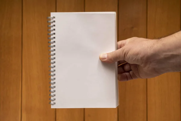 Блок Нотной Бумаги Руке — стоковое фото
