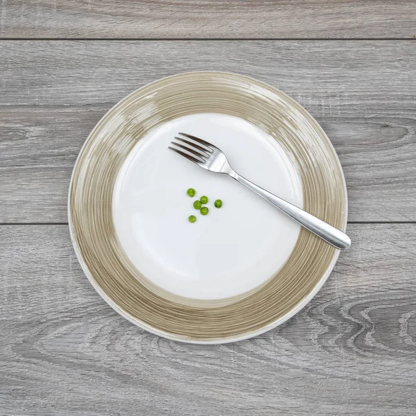Some Green Peas Plate Wooden Table — Stock Photo, Image
