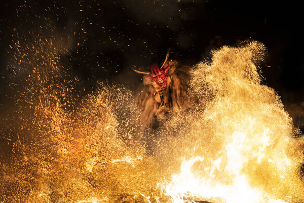 Tarvisio, Italy. December 5, 2018.   The Krampus masks in an exhibition in the night in Tarvisio, Italy