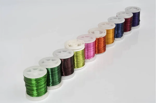 Some Spools Colored Metallic Thread — Stock Photo, Image