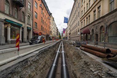  Stockholm'de bir sokakta boru döşeme
