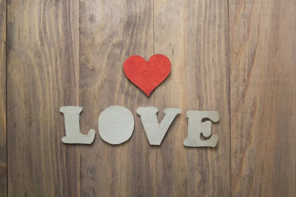 Hintergrund Mit Herz Und Den Worten Liebe Auf Holztisch — Stockfoto