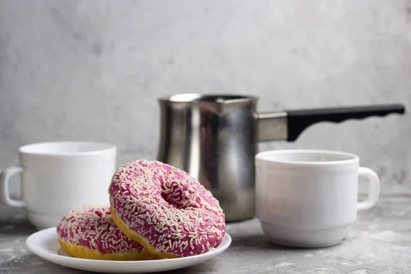 Close Two Donuts Plate Blurred Coffee Cups Background — Stock Photo, Image