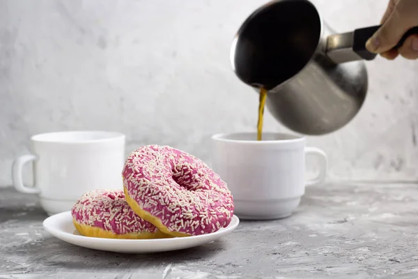 Two Donuts Plate Womans Hand Pours Coffee Cezve — Stock Photo, Image