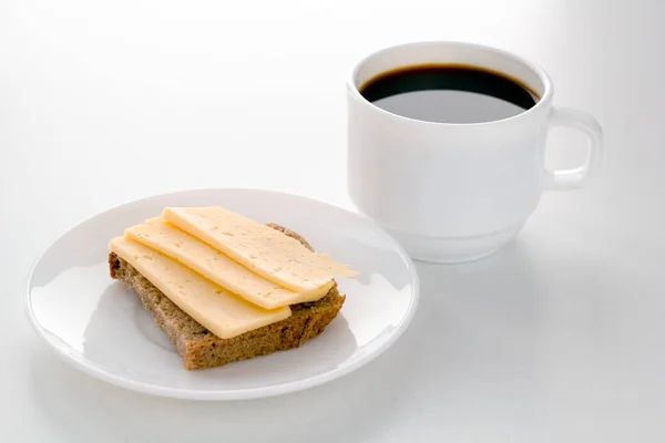 Kaffeetasse Und Käsebrötchen Zum Frühstück — Stockfoto