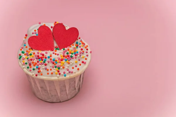 可爱的纸杯蛋糕上粉红色的柔和背景 — 图库照片
