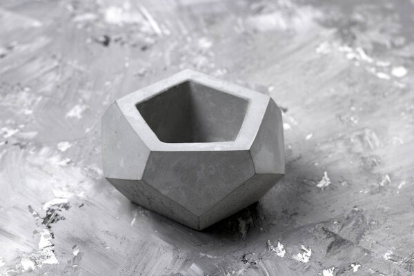 concrete pot on a concrete background interior decor element