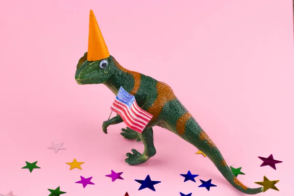 Lustiger Grüner Dinosaurier Aus Plastik Mit Flagge — Stockfoto