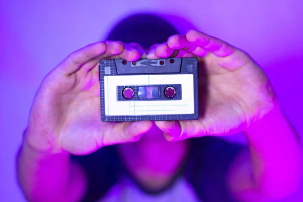 Close Vintage Audio Cassette Hands Man Pink Purple Neon Light — Stock Photo, Image