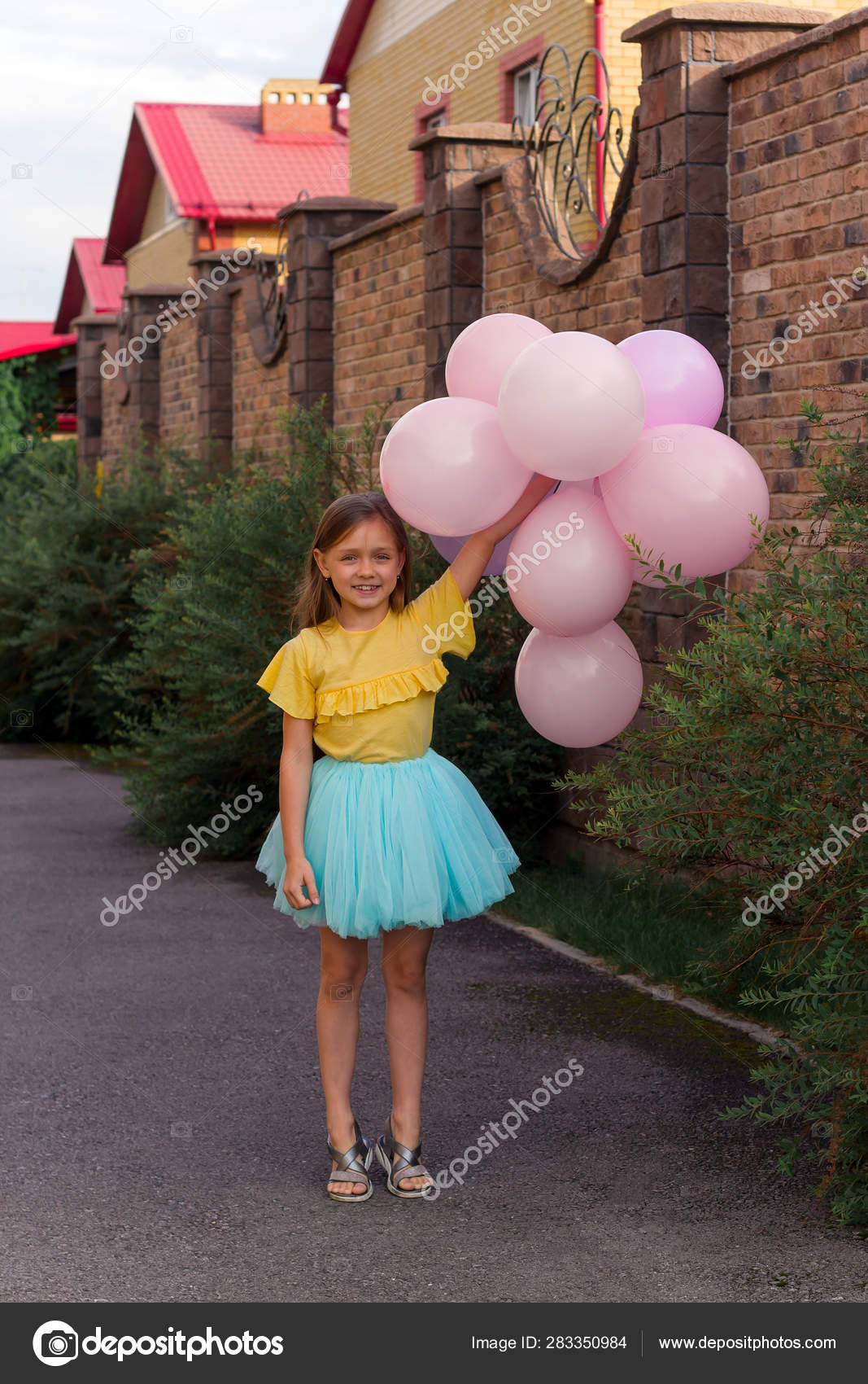 yellow shirt and blue skirt