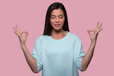 Beautiful asian american brunette portrait, zen mind, peace, calm, wellness, mindfulness and inner balance