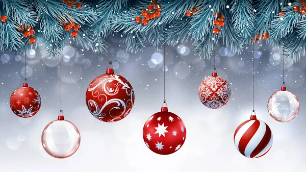 Mavi çam dalları ile kırmızı Noel süsleri