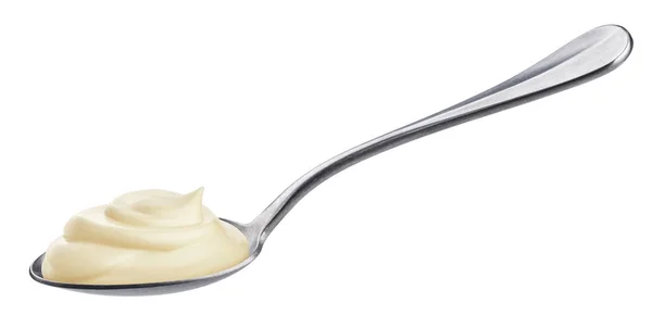 Sour cream in spoon isolated on white background — Stock Photo, Image