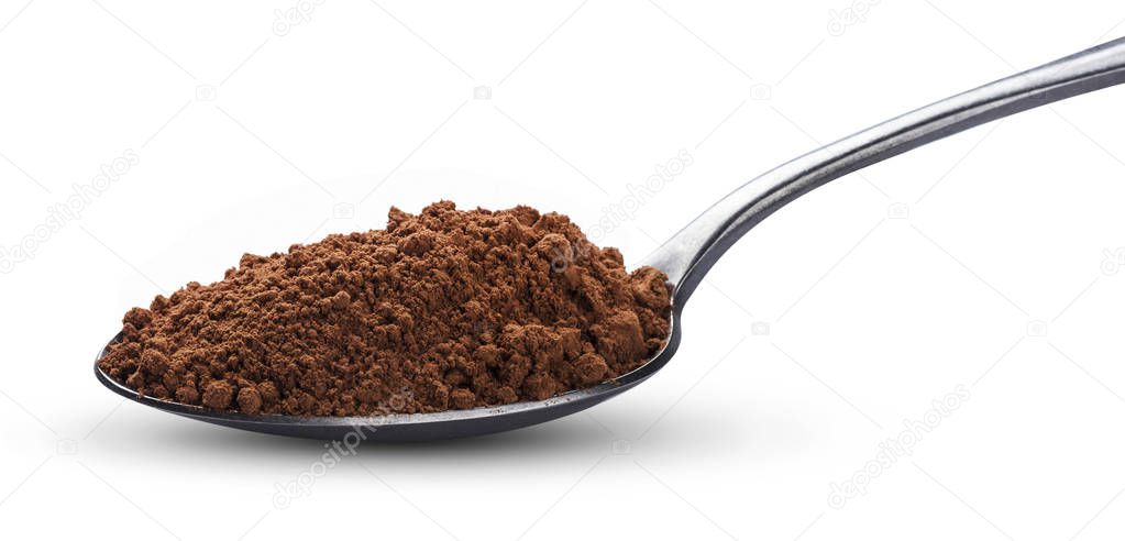 Cocoa powder in spoon isolated on white background. Top view