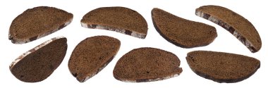 Slices of black rye bread isolated on white background clipart