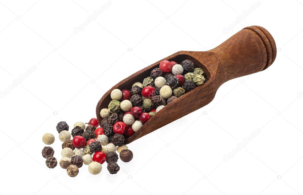 Pepper mix. Black, red, white and allspice peppercorns in scoop isolated on white background