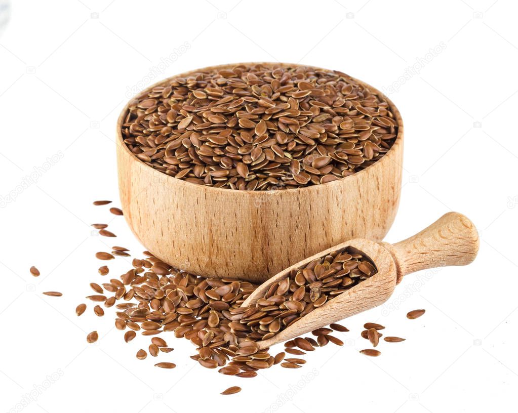 Flax seeds isolated on white background with clipping path, close-up of flaxseed in wooden scoop and bowl