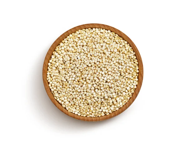 Trä skål quinoa frön isolerad på vit bakgrund, ovanifrån — Stockfoto