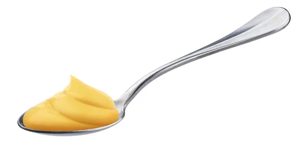 Maionese em colher isolada no fundo branco, redemoinho de molho de queijo amarelo — Fotografia de Stock