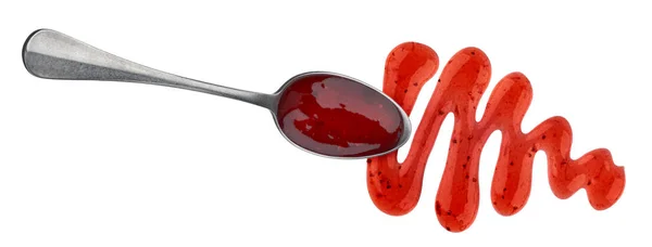 红色浆果果酱在勺子隔离在白色背景 — 图库照片